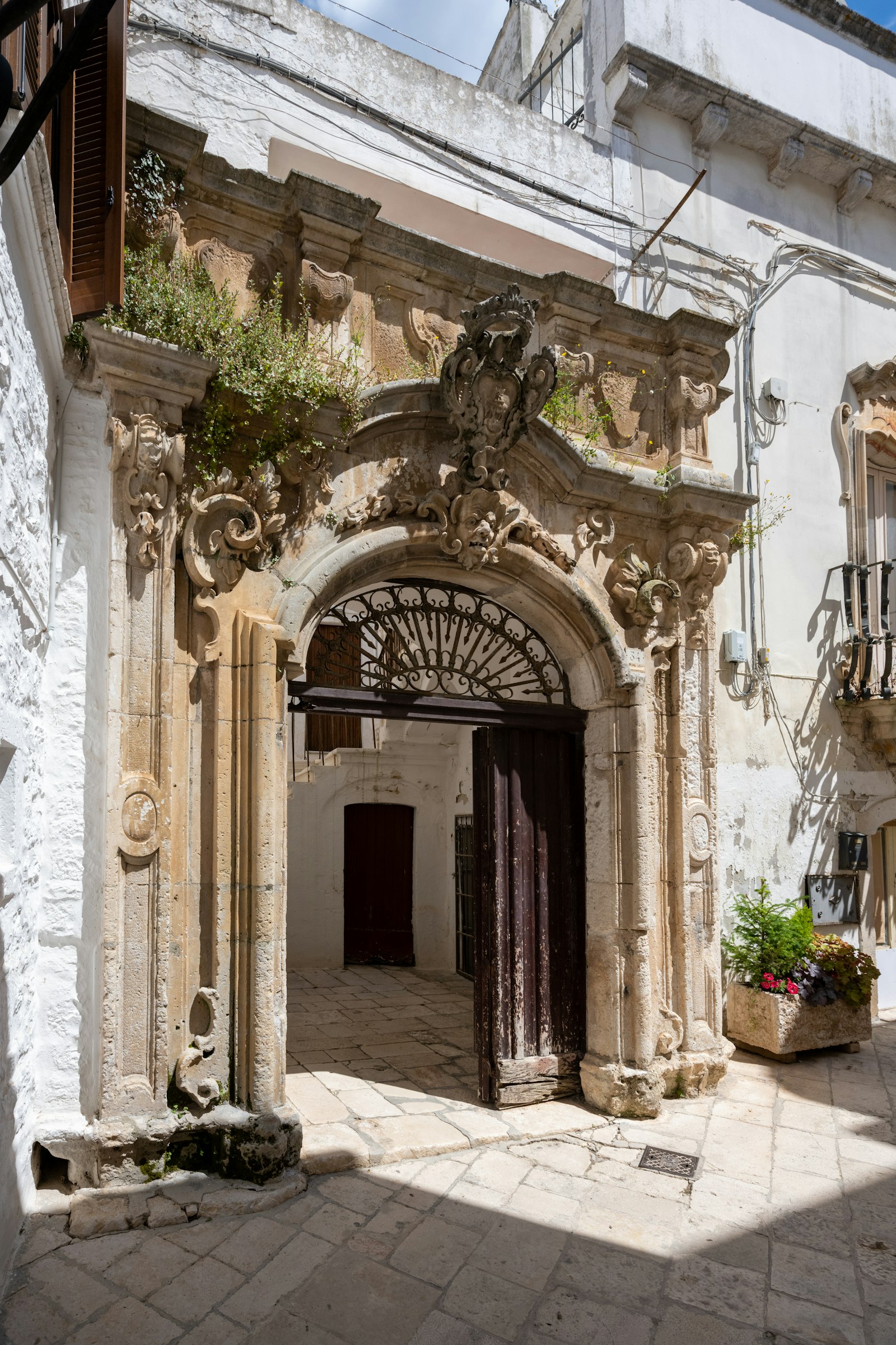 An ornate doorway in old stone
